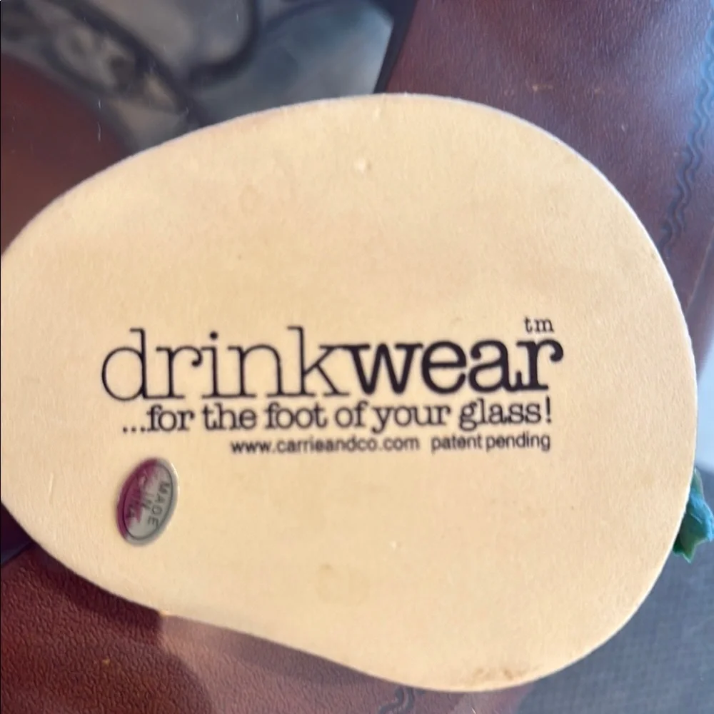 Gama Go Beer Goggles Set with wine glass footwear and lily pad wine stopper.